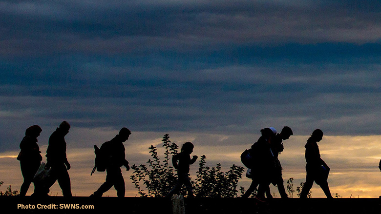 Refugees and migrants walking 